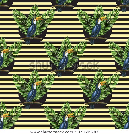 Toucan banana leaves on striped 450w 370595783