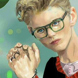 Мальчик в очках.