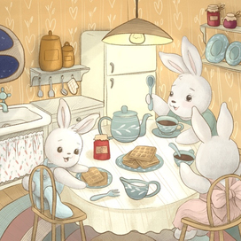 Малыши кролики за столом.