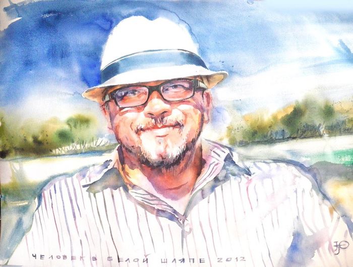 человек в белой шляпе