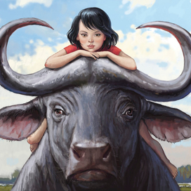 Девочка на буйволе.