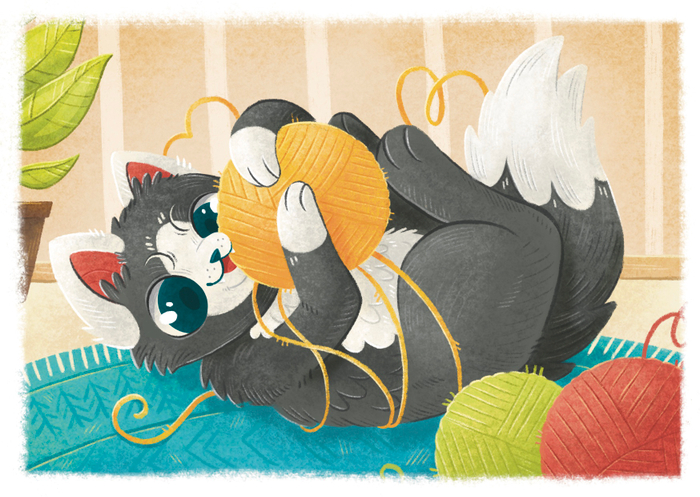 Котик играет с клубком