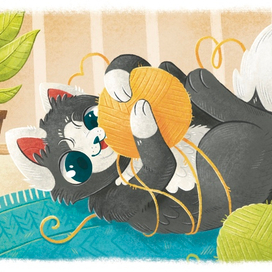 Котик играет с клубком