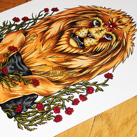 ^lion on the stone with tiny flowers