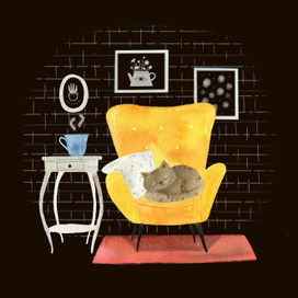 Котик спит на желтом кресле