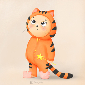 Котёнок в костюме тигрёнка 