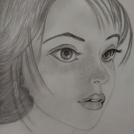 Девочка с веснушками