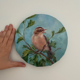 Поющая птица