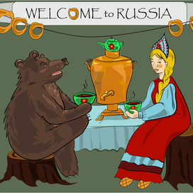 Медведь и девушка пьют чай из самовара