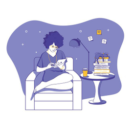 Девушка читает в кресле