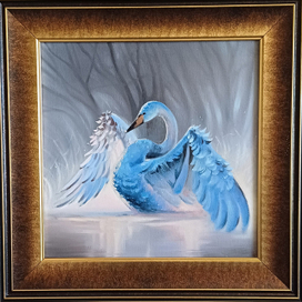 Лебедь на озере