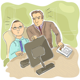 Коллеги совещаются перед монитором компьютера 