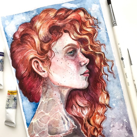 Рыжеволосая девушка