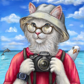 Кошка фотограф
