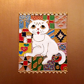 котейка на лоскутном одеяле