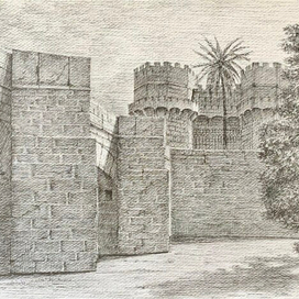 Вид на мост и башни Torres de Serranos из парка Турия.