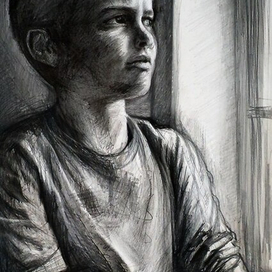 Мальчик у окна