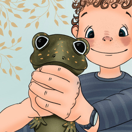 Малыш поймал лягушонка