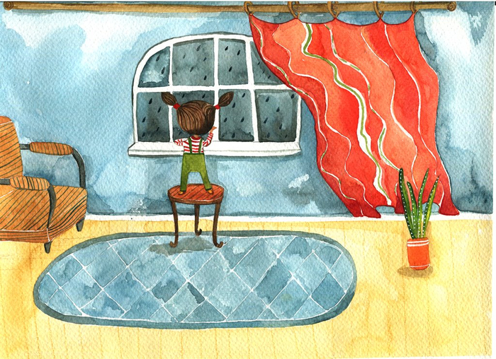 Девочка смотрит в окно