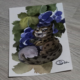 Маленькая кошечка в саду