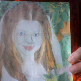 Невеста рядом с апельсиновым деревом.