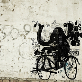 Слон на велосепеде 