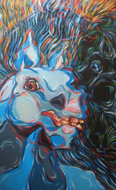 три коня в траве