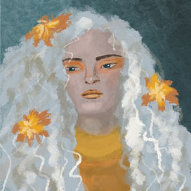 Кудрявая девушка с цветами в волосах
