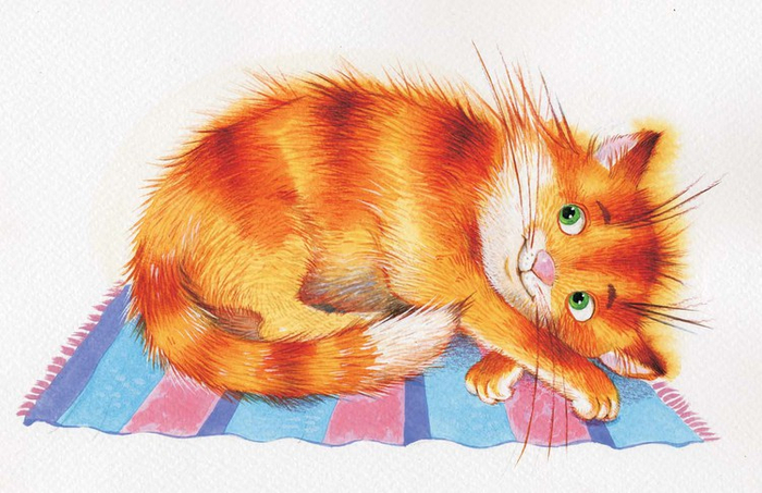 кошка на коврике