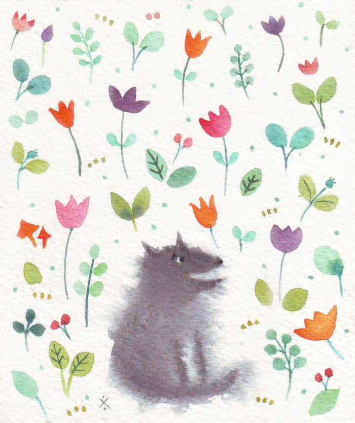 Маленький волк на полянке.