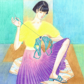 Девушка пришивает бусину