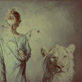 a boy and white lion