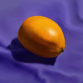 Лимон на контрастного цвета драпировке