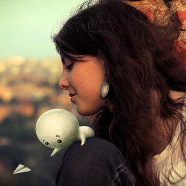 Рисованній персонаж на фото