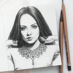 Мила Кунис, портрет