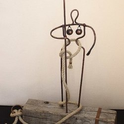 Женщина с веслом