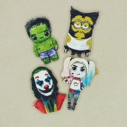 Часть коллекции брошей по комиксам