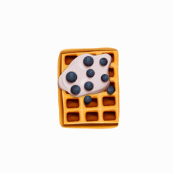 Sweet breakfast.  Waffles with blueberries.