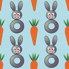 Кролик-погремушка и морковка на голубом фоне