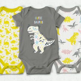Дизайн детских боди с иллюстрациями динозавров.
