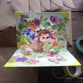 Акварельная открытка с ежиком и цветами