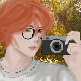 Парень с камерой