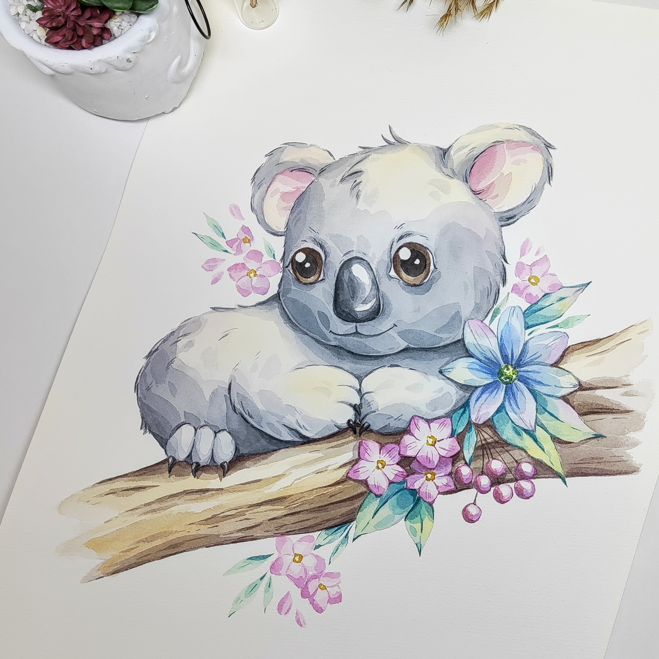 Животное Коала на дереве с цветами