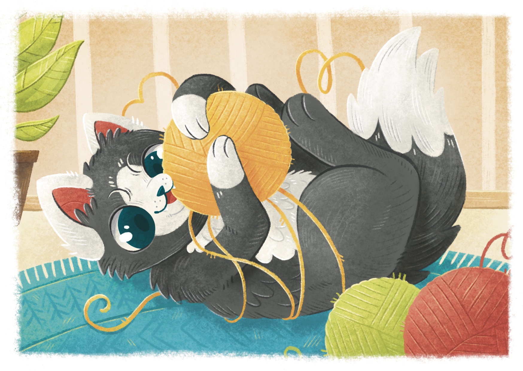 Котик играет с клубком