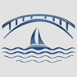 Парусная лодка под мостом.