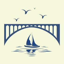 Парусная лодка под мостом.