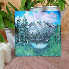 Горные хребты и розовые облака