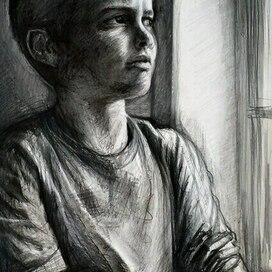 Мальчик у окна