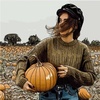 The girl with a pumpkin.