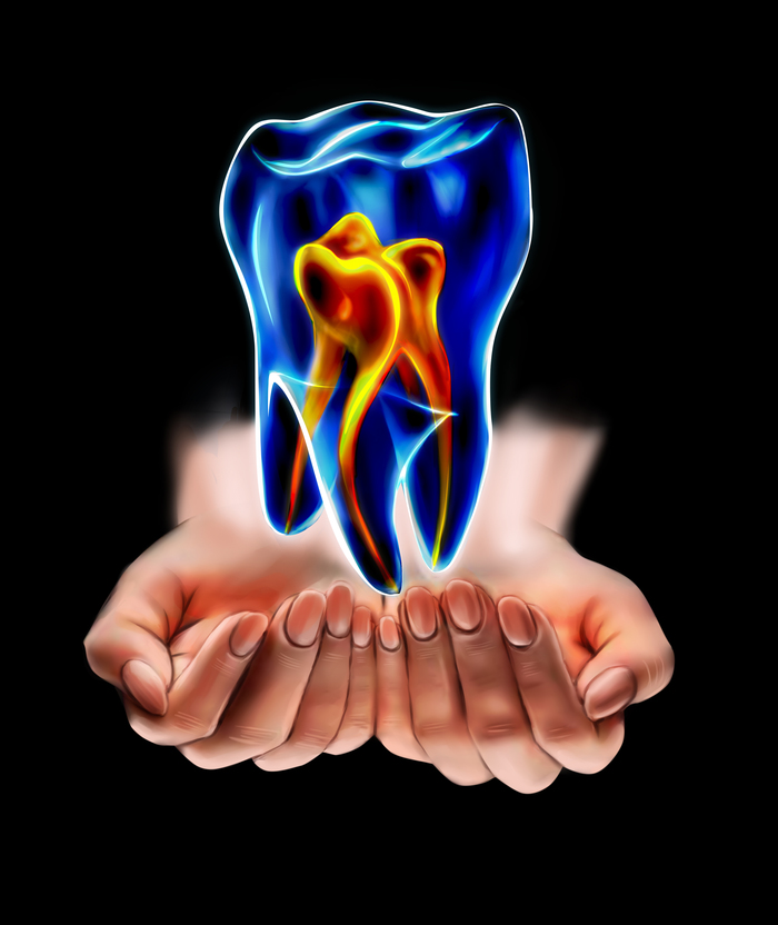 Зуб в руках